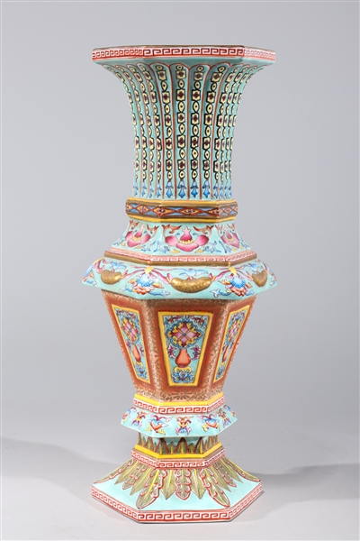 Appraisal: Chinese famille rose faceted enameled porcelain vase with gilt detail