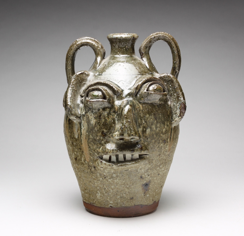 Appraisal: GROTESQUE FACE JUG BY B B CRAIG Burlon Craig Vale