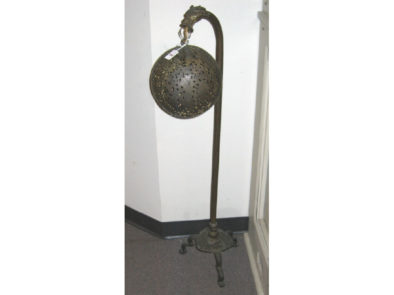 Appraisal: ASIAN BRASS FLOOR LAMP With pierced globular hanging fixture decorated