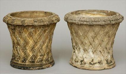 Appraisal: PAIR OF TERRACOTTA BASKET-FORM URNS BY DOULTON CO LAMBETH in