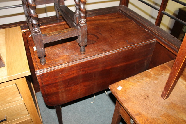 Appraisal: A GEORGIAN MAHOGANY PEMBROKE TABLE fitted with drop flaps and