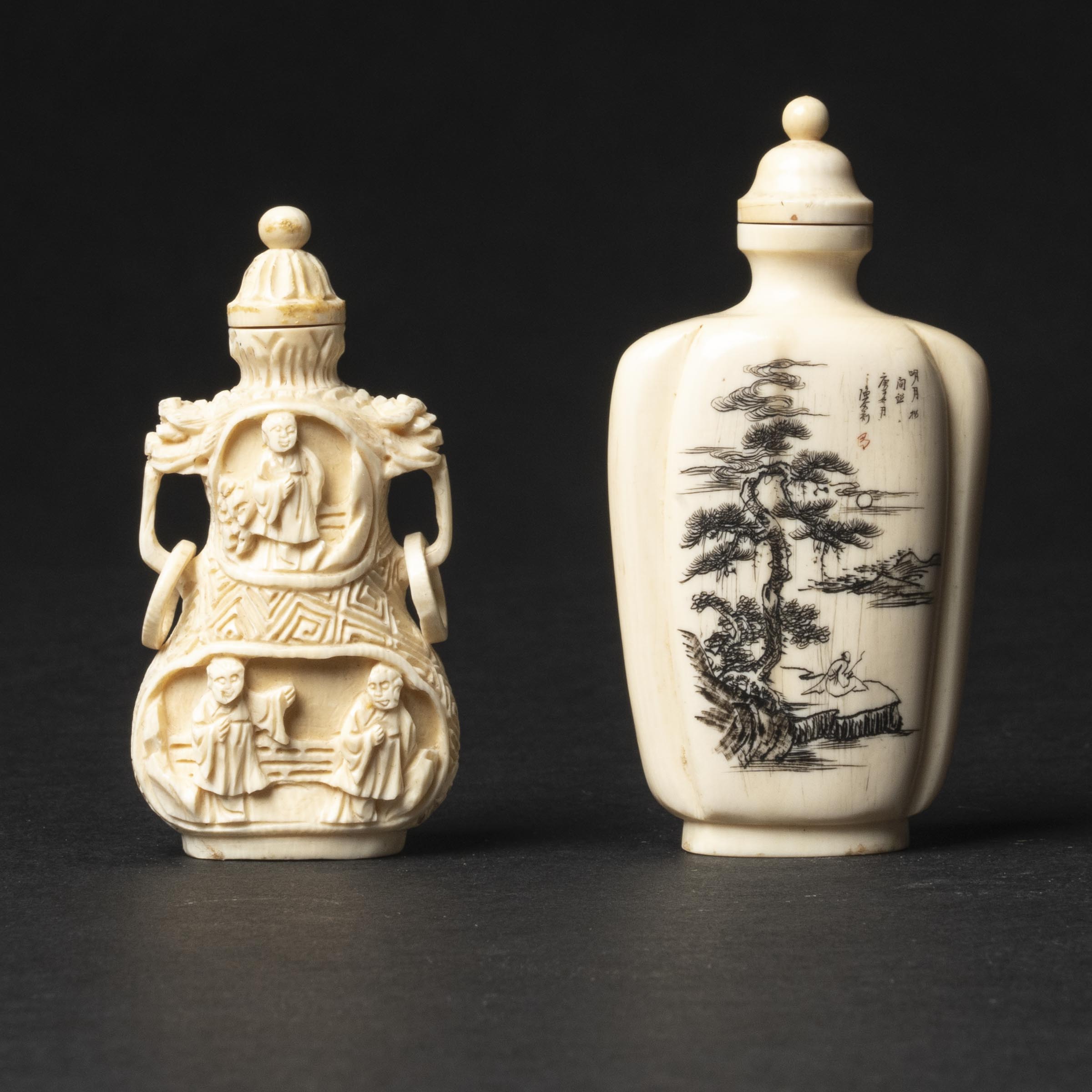 Appraisal: Two Carved Ivory Snuff Bottles th Century tallest height in