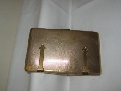 Appraisal: A CT GOLD CIGARETTE CASE of canted oblong folding form