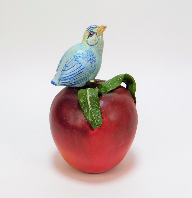 Appraisal: SERGIO BUSTAMANTE SURREALIST BIRD APPLE SCULPTURE Mexico b Depicts a