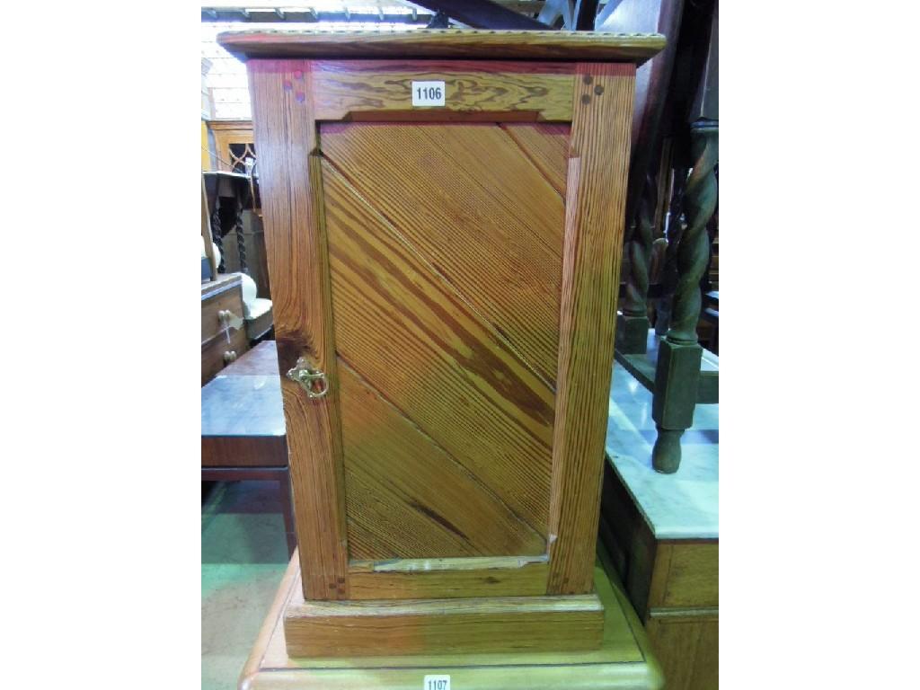 Appraisal: A Victorian gothic revival pitch pine bedside cupboard enclosed by