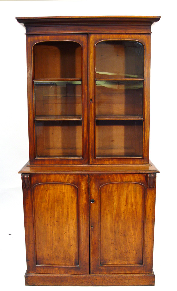 Appraisal: Victorian walnut bookcase with moulded cornice above a pair of