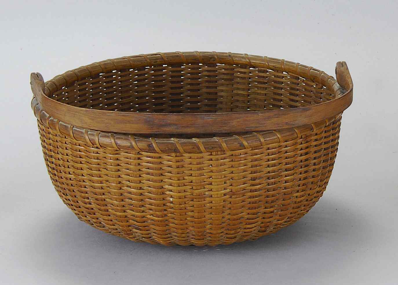 Appraisal: NANTUCKET BASKETNantucket Early th CenturySigned Fanny L Hevlin Nantucket ''