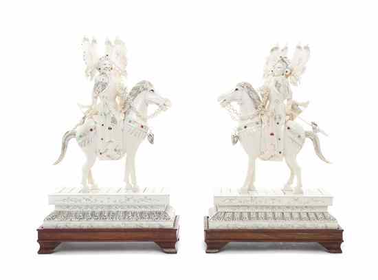 Appraisal: A Pair of Chinese Carved Ivory Horseback Figures depicting a