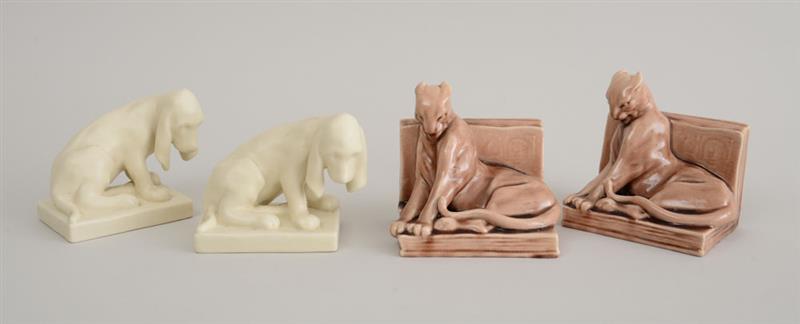 Appraisal: TWO PAIRS OF ROOKWOOD GLAZED POTTERY ANIMAL-FORM BOOKENDS The one