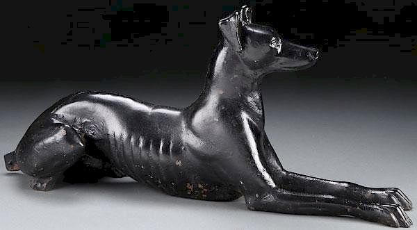 Appraisal: A PAINTED CAST IRON DOG DOORSTOP LATE TH C A