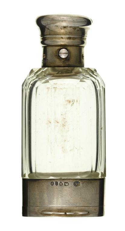 Appraisal: A VICTORIAN SILVER MOUNTED GLASS SCENT BOTTLE-VINAIGRETTE the faceted bottle