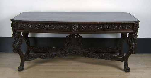 Appraisal: Victorian carved mahogany library table th c h w d