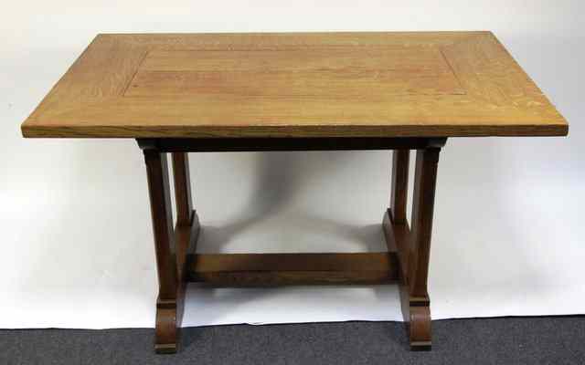 Appraisal: An oak kitchen table on trestle ends cm wide