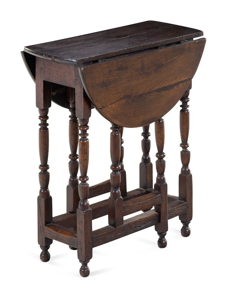 Appraisal: A Jacobean Turned Oak Gate-Leg Low Table A Jacobean Turned