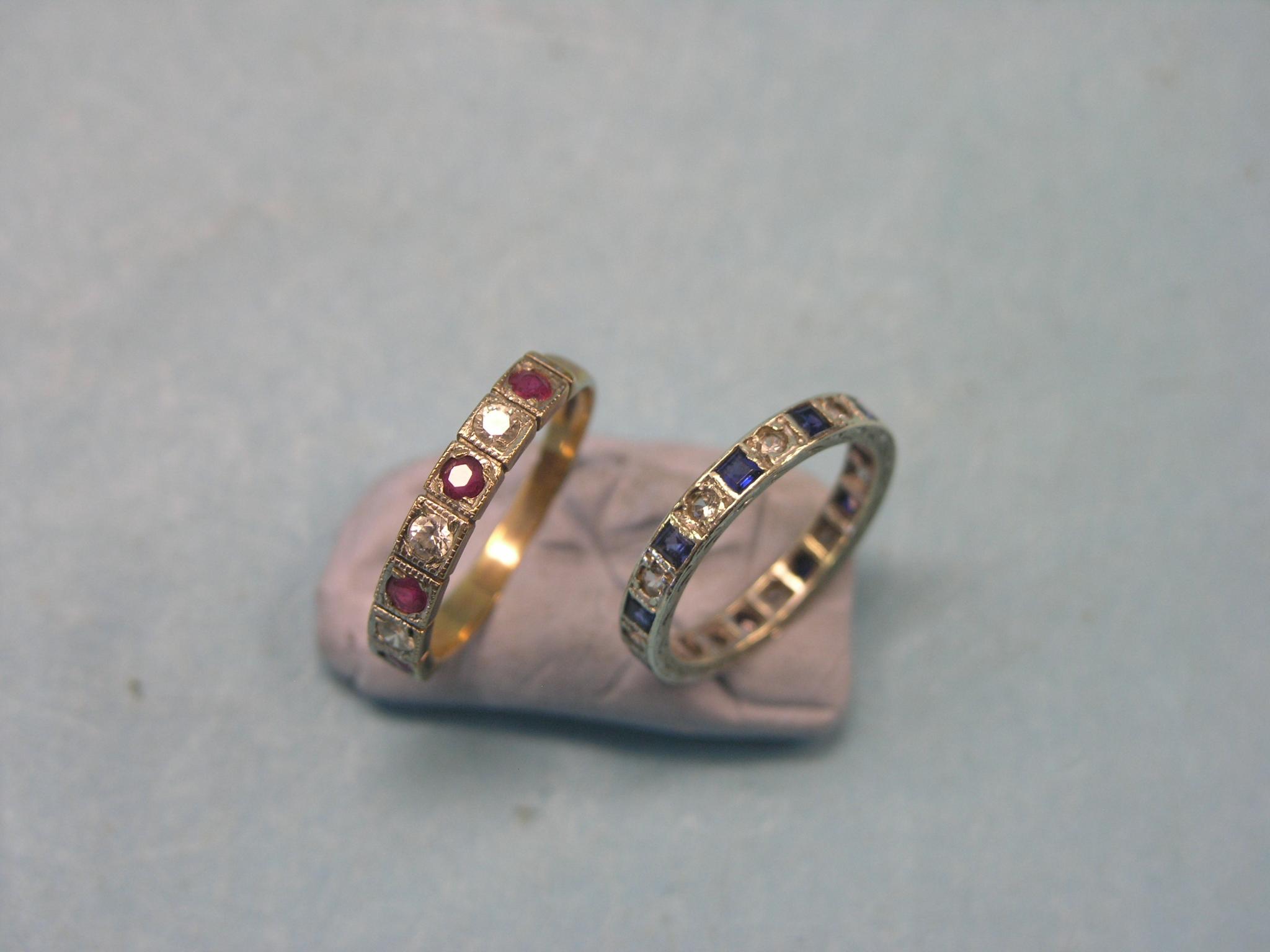 Appraisal: A ct gold half-eternity ring set clear and red stones