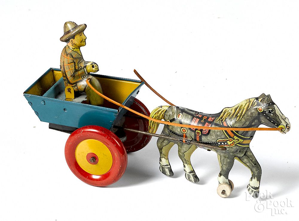 Appraisal: Marx tin litho windup horse drawn cart Marx tin litho