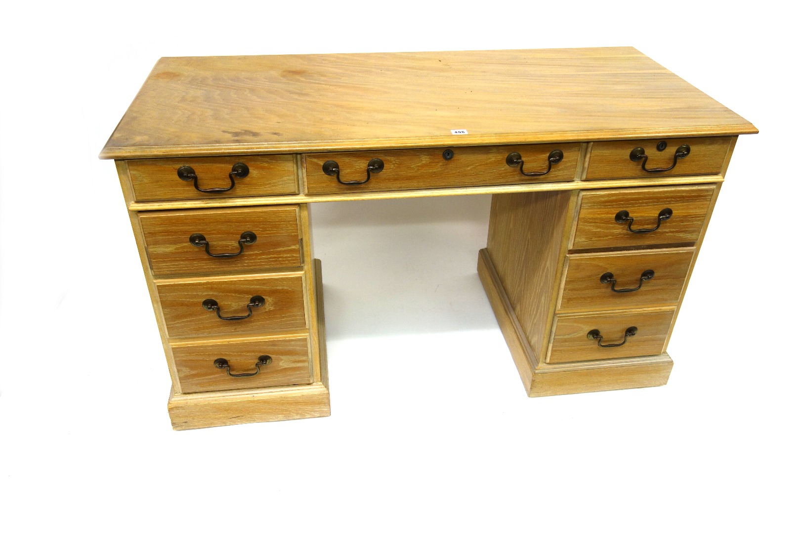 Appraisal: An American light oak finish kneehole desk by National Mt