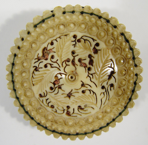 Appraisal: Carved and pierced bone sewing pin cushion cm diameter