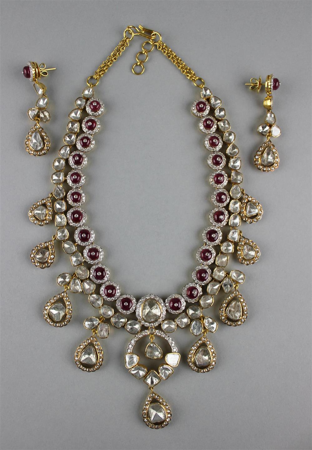 Appraisal: MUGHAL GOLD DIAMOND AND RUBY NECKLACE AND EARRINGS the necklace