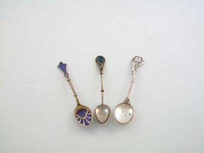 Appraisal: Three enamelled coffee spoons a Norwegian example with English import