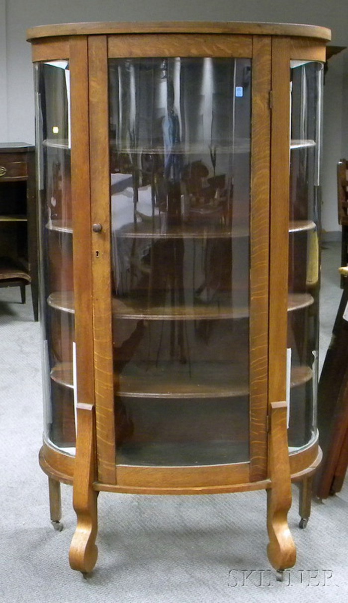 Appraisal: Early th Century Oak D-shaped China Cabinet the interior with