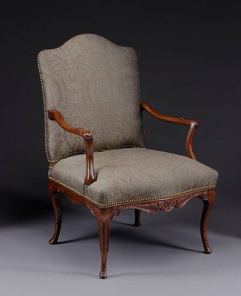 Appraisal: A Louis XV carved walnut fauteuil mid th century The