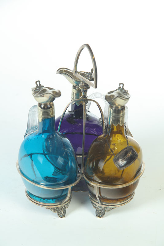 Appraisal: DECANTER SET England nd half th century Three colored blown