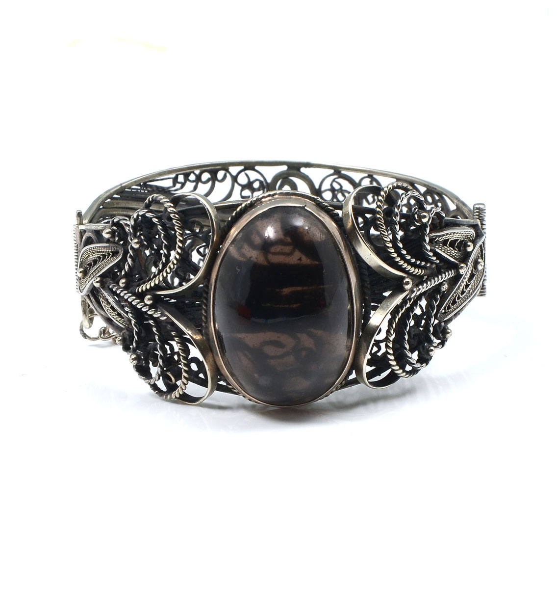 Appraisal: STERLING FILIGREE AMBER CUFF BRACELET Beautifully detailed filigree work featuring