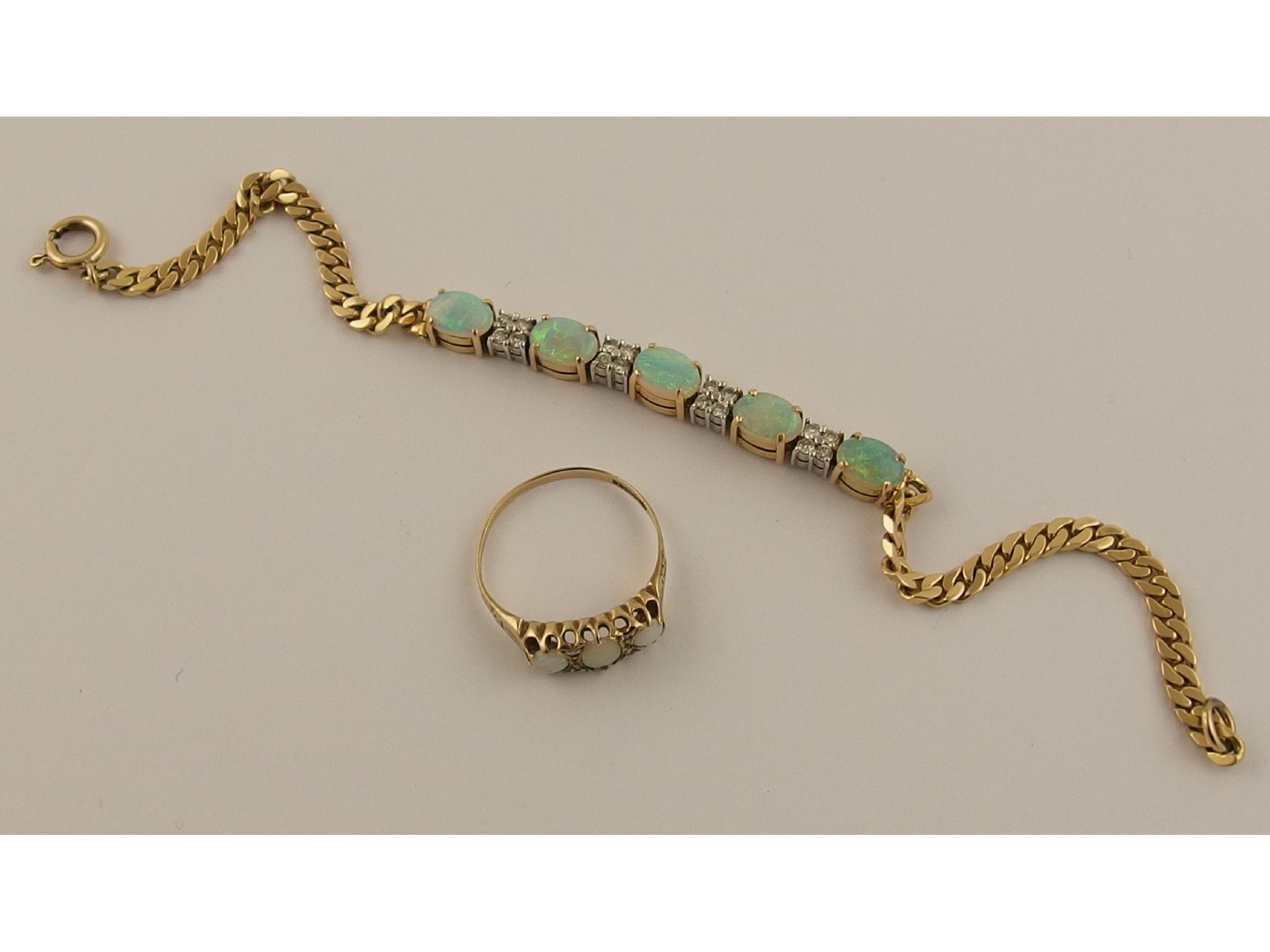 Appraisal: A ct opal and diamond bracelet and similar ring