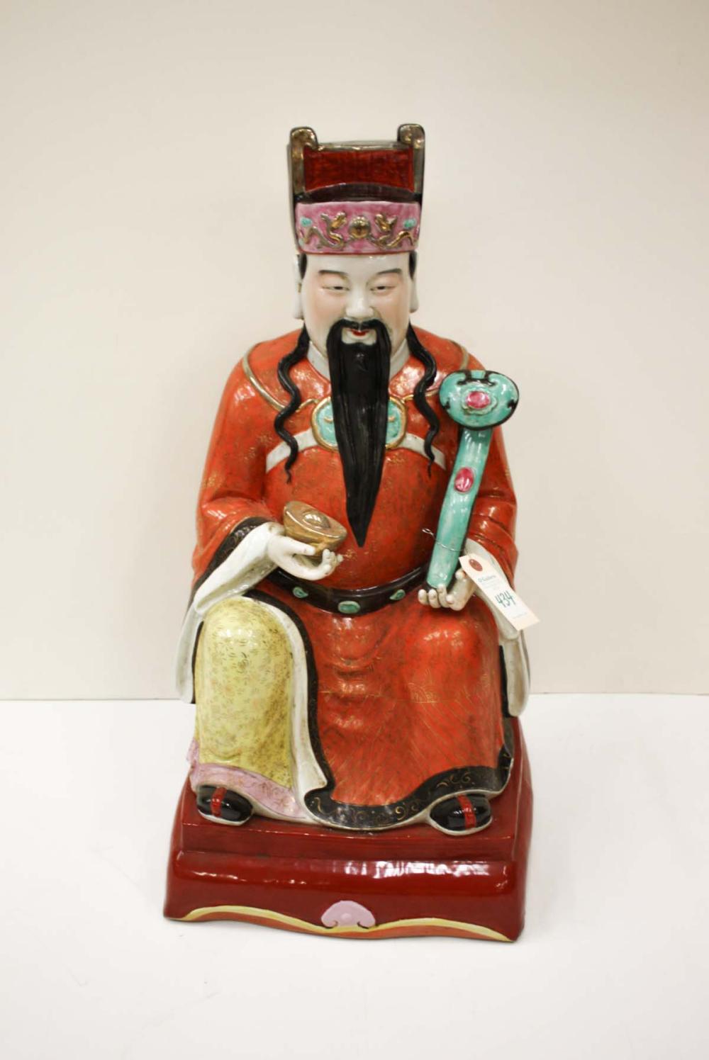 Appraisal: A LARGE CHINESE PORCELAIN FIGURE a Ming Dynasty emperor in