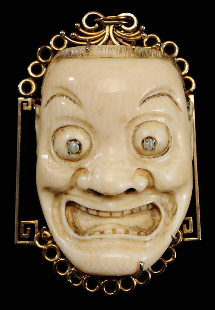 Appraisal: Ivory Netsuke Japanese th century carved as an oni with