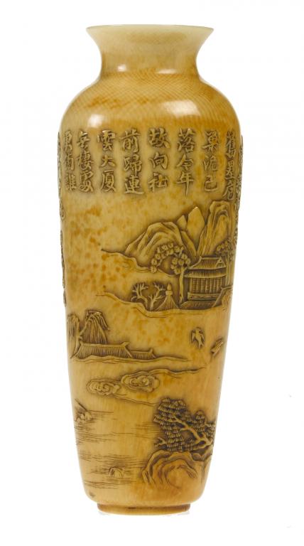 Appraisal: A CHINESE IVORY VASE of tapering section carved in shallow