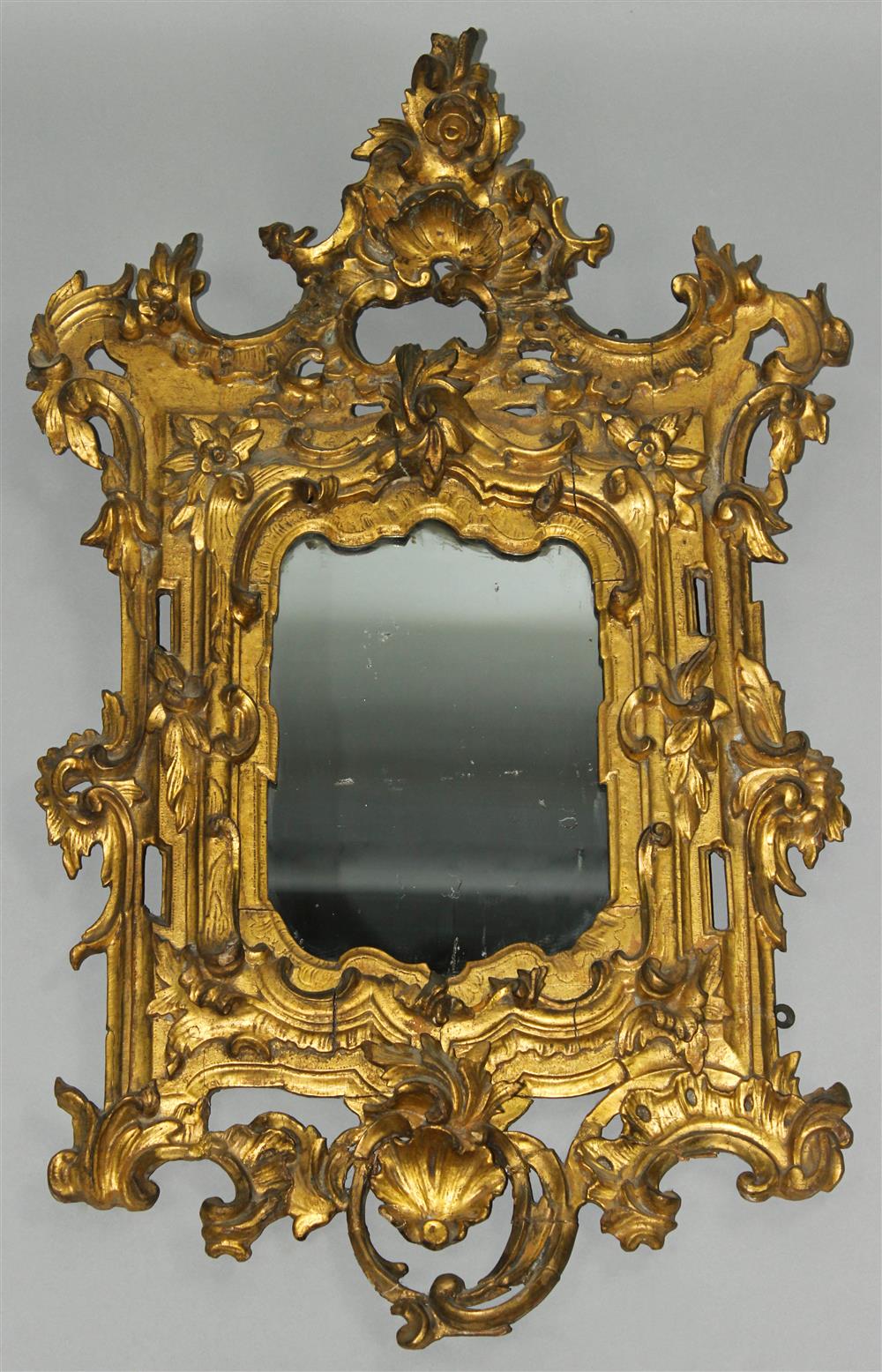 Appraisal: ITALIAN ROCOCO CARVED GILTWOOD MIRROR TH CENTURY the mirror frame