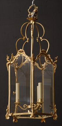 Appraisal: LOUIS XV-STYLE GILT-METAL LANTERN The -sided case cast with rococo