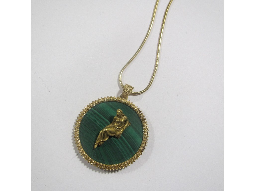 Appraisal: Circular malachite pendant with applied gold goddess of plenty figure