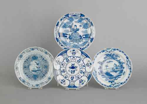 Appraisal: Four Delft blue and white plates th th c approx