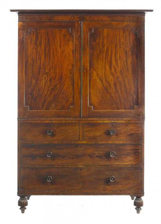 Appraisal: A WILLIAM IV MAHOGANY LINEN PRESS the widely flared cornice