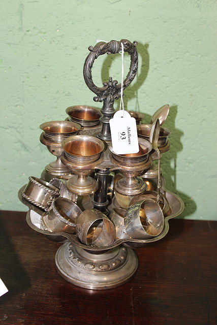 Appraisal: A SILVER PLATED SIX PIECE EGG CUP CRUET SET a