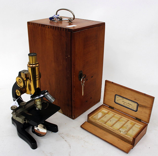 Appraisal: A STUDENT'S MICROSCOPE by Ernst Leitz with black lacquered stand