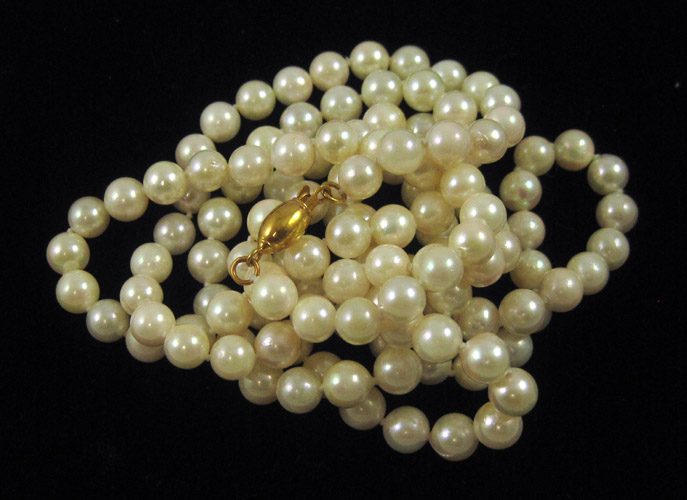 Appraisal: PEARL AND FOURTEEN KARAT GOLD NECKLACE inches in length and