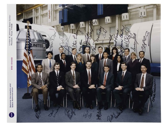 Appraisal: Shuttle Astronauts Group An official NASA color photograph of of