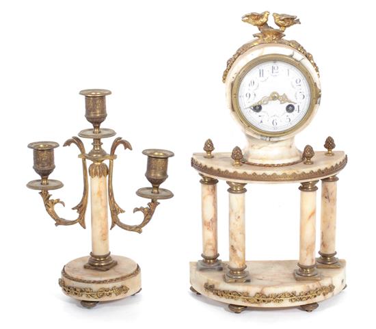 Appraisal: French marble mantel clock and candelabra th century clock H