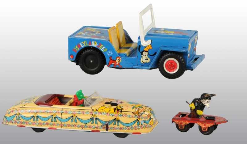 Appraisal: Lot of Tin Litho Disney Toy Train Items Description American