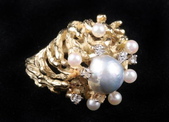 Appraisal: K YELLOW GOLD DIAMOND AND PEARL DOME RING Silver baroque