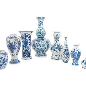 Appraisal: A Group of Eight Blue and White Earthenware Vases Primarily