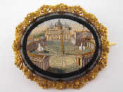 Appraisal: A yellow metal tests high carat gold micro mosaic brooch