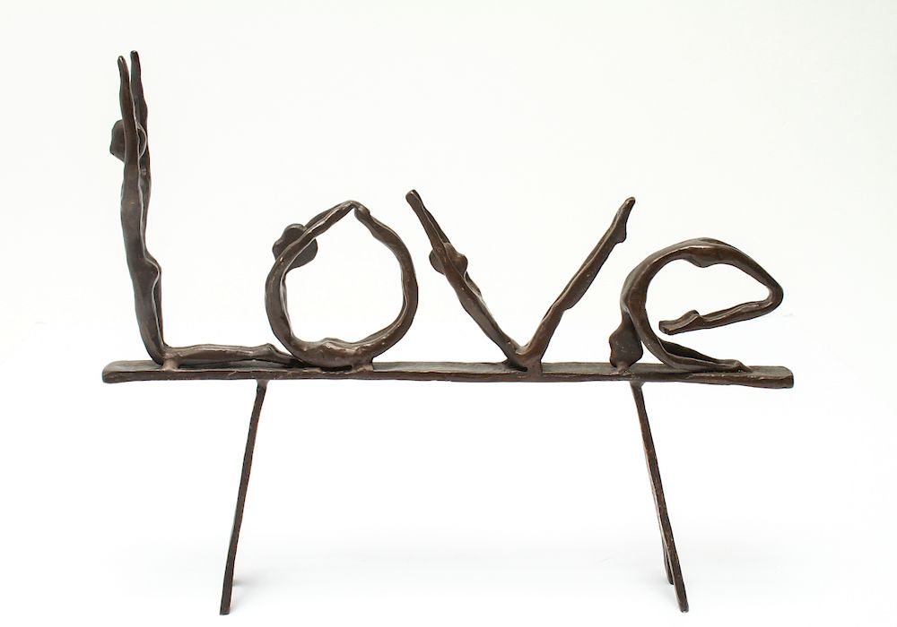 Appraisal: Modern Bronze Love Figural Tabletop Sculpture Modern bronze Love tabletop