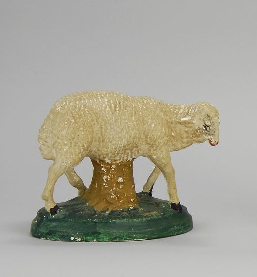 Appraisal: UNUSUAL CHALKWARE FIGURE OF A LAMB th CenturyWith green and