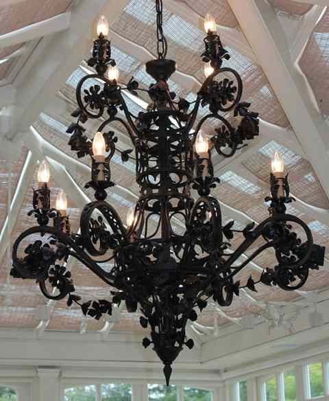 Appraisal: A LARGE PAINTED WROUGHT IRON TWELVE LIGHT TWO TIER ELECTROLIER