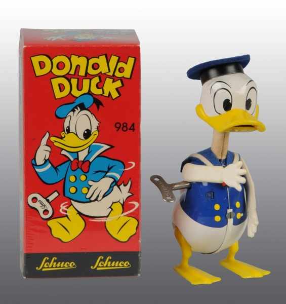 Appraisal: Tin Schuco Disney Donald Duck Wind-Up Toy Description German Working